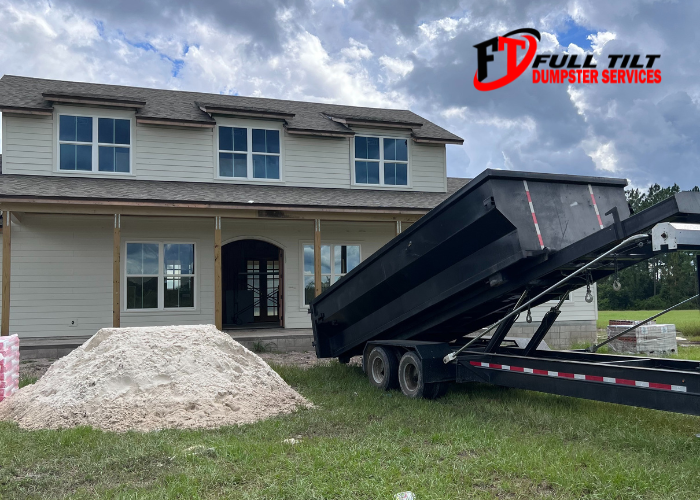 dumpster rental unloading materials at a construction site in macclenny, FL